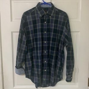 Long sleeve Tailorbyrd logo shirt. Blue plaid with contrast inside cuff.